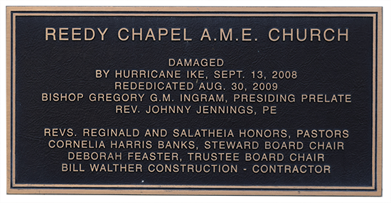 Plaque describing a house of worship's recovery efforts following 2008's Hurricane Ike