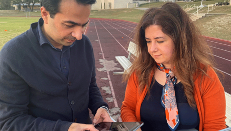 Morteza Seidi (left) and Marzieh Hajiaghamemar (right), assistant professors in the UTSA Department of Biomedical Engineering, are leading an innovative research project to more accurately detect concussions in football players.